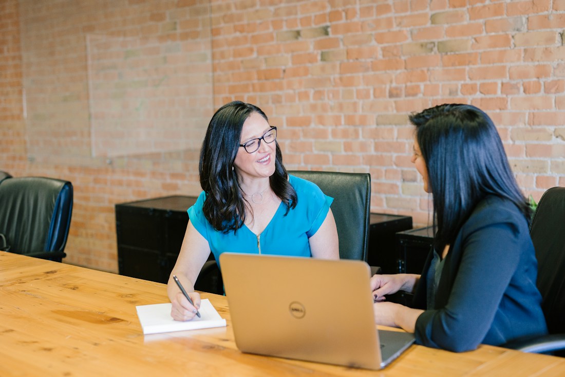 Business owners reviewing marketing performance